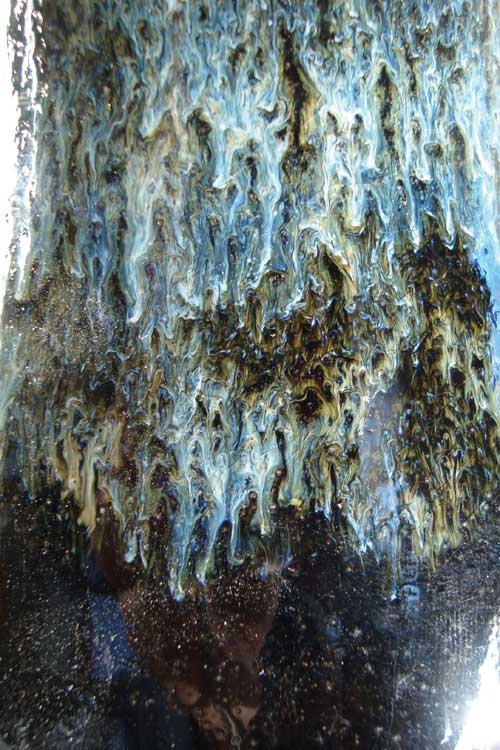 Silver Iron Cup (detail), porcelain with a hare’s fur combination glaze – two coats of John’s SG-12, one coat Candace Black, and one coat of Hamada Rust, cone 10 oxidation.