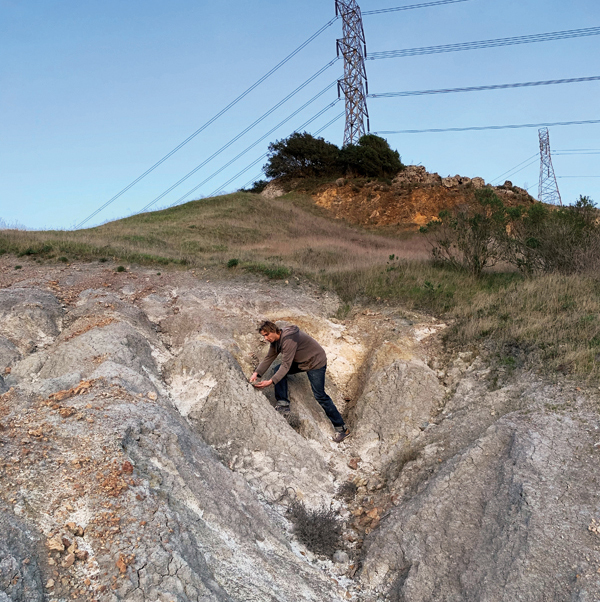 D Fishman collecting clay. Note the variation in color and texture in the relatively small area. Photo: Kate Gibbs.