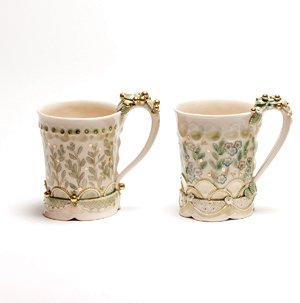 Claire Prenton’s cup, 4 in. (10 cm) in height, handbuilt porcelain, glaze, fired to cone 6 in oxidation, 20-Karat gold.