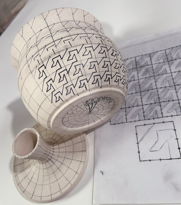 4 Mark each grid into quarters then transferring the pattern to the pot. Go over the pattern lines only with a Sharpie marker.