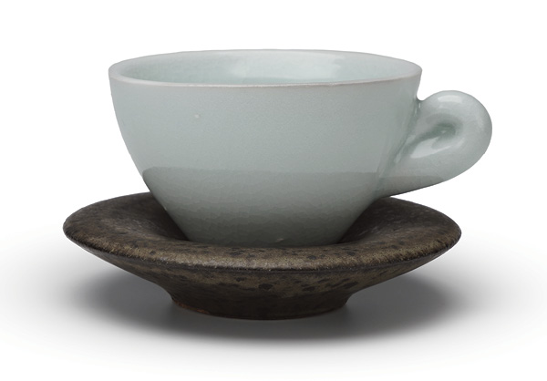 Espresso cup and saucer, porcelain, iron-rich stoneware, fired in reduction to cone 10, 2024.