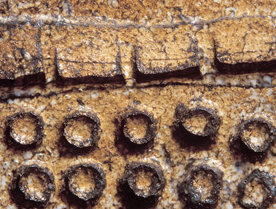 A close-up view of a salt-fired surface. This photo clearly illustrates the light/dark patterns associated with the salt fire.