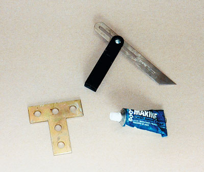 A T-bevel with a 9-inch adjustable blade (these are readily available at home improvement stores); galvanized T-fitting; epoxy-type glue.