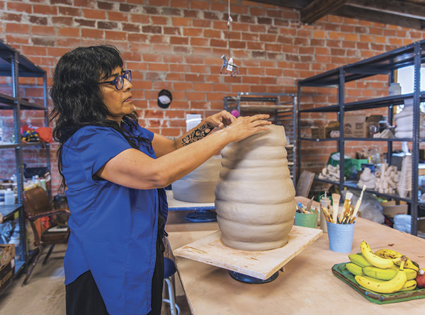 5 Erika Nj Allen, 2023 Bray Summer Resident Artist, working on a piece in the Summer Studio. Residency venue: Archie Bray Foundation, Helena, Montana.