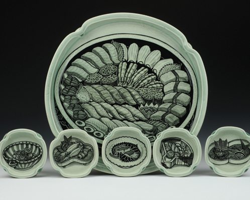 Sushi platter set, individual view showing the illustrations on all of the plates. Photo: Charlie Cummings Gallery.