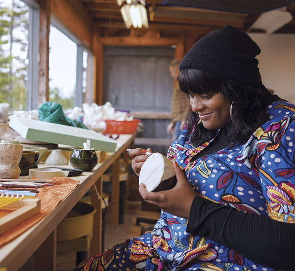 3 An artist resident working in the clay studio during Open Studio Residency, June 2023.