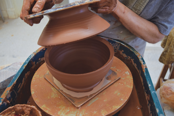 2 Throw a second bowl to the same rim diameter. Open it up all the way to the bat. Trim the angle of the rim upward.